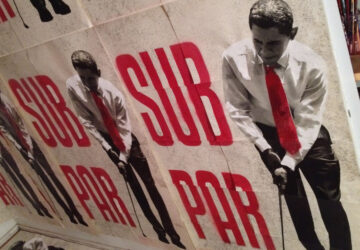 A close up of the word sub par on a poster