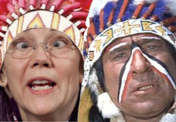 A woman wearing a native american headdress and a man with an indian head dress.