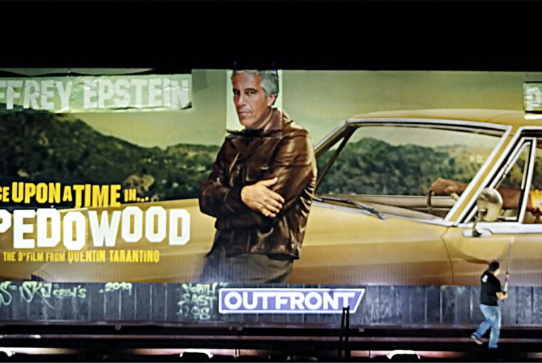 A billboard of the movie " drive in hollywood ".