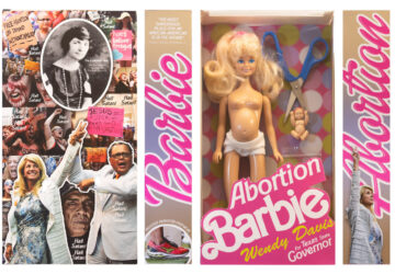 A barbie doll is in the box next to another doll.
