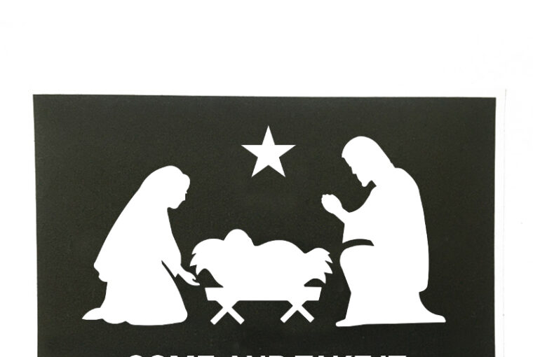 A black and white picture of the nativity scene.